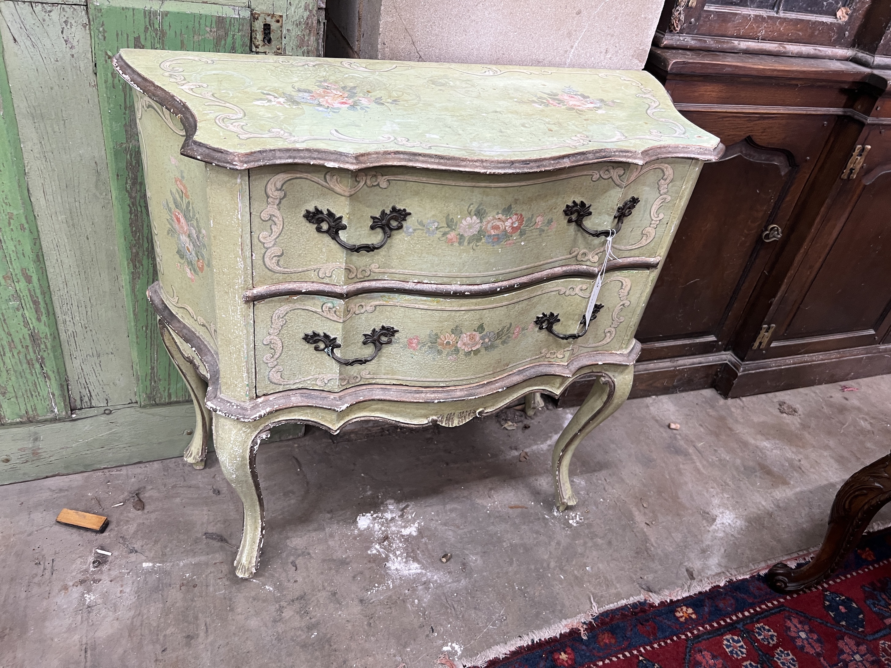 A small Louis XVI style painted two drawer chest, width 77cm, depth 32cm, height 74cm